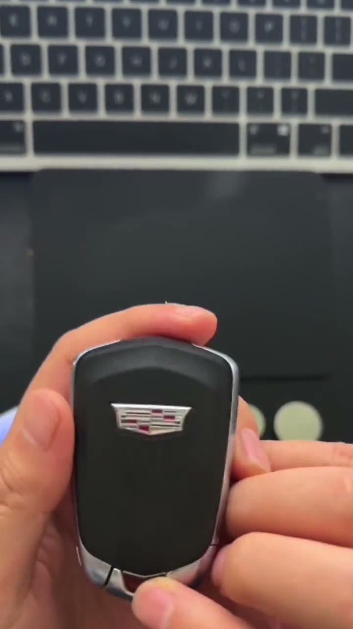 Key fob battery compartment and clip charger